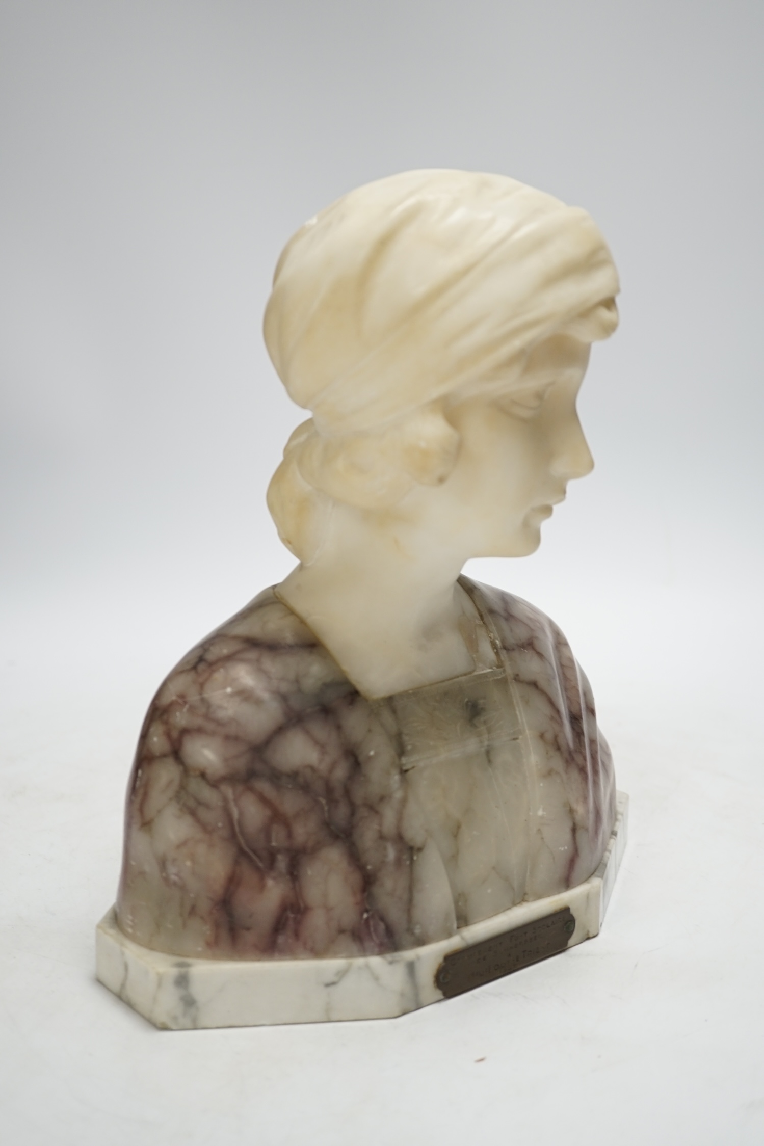 Gustave Van Vaerenbergh (1873-1927), an alabaster bust of a lady, applied plaque, signed to the reverse, 26cm high